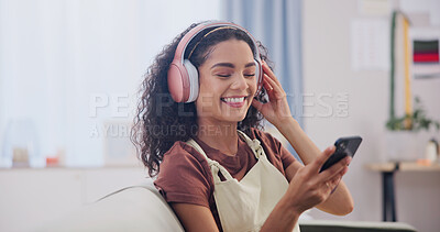 Buy stock photo Headphones, happy and woman on sofa for music subscription, streaming and track on weekend. Relax, home and person with audio, radio and phone for mobile app, good mood and break with playlist