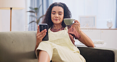 Buy stock photo Reading, coffee and woman with phone for texting, notification or online dating app in home. Communication, relax and person in living room with tech and drink for social media, message or chat