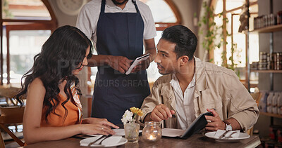 Buy stock photo Waiter, menu and couple in restaurant for date, connection or bonding on weekend together. Discussion, food and server with man and woman for decision on dinner, meal or supper order in diner.