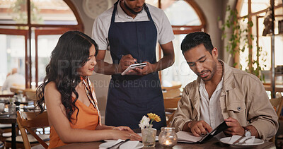 Buy stock photo Server, menu and couple in restaurant for date, connection or bonding on weekend together. Discussion, food and waiter with man and woman for decision on dinner, meal or supper order in diner.