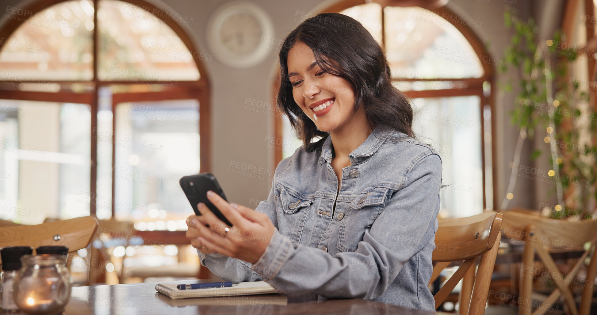 Buy stock photo Reading, phone and relax with woman in restaurant for online review, communication and menu search. Coffee shop rating, connection and contact with person and tech for social media, scroll and chat