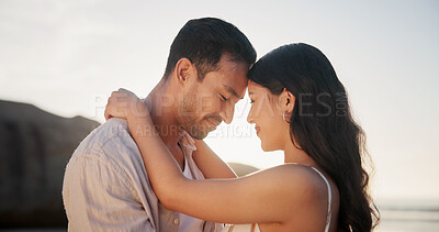 Buy stock photo Love, tender or couple at beach with hug, romantic moment or bonding together on summer holiday. Care, embrace or people with forehead touch, partner connection or happy relationship on outdoor trip.