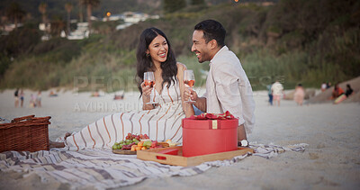 Buy stock photo Love, wine or couple at beach with picnic, holiday together or bonding on anniversary celebration. Happy, honeymoon or people with alcohol, partner connection or special moment on outdoor getaway.