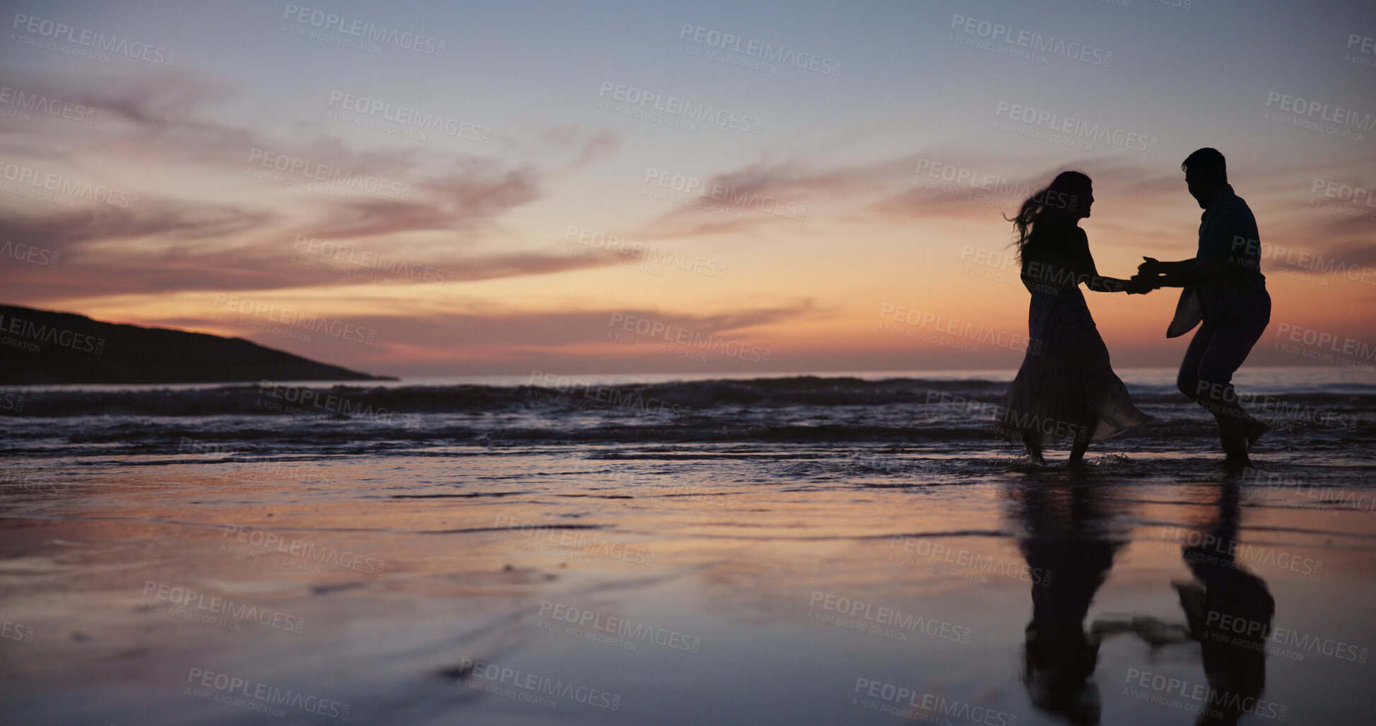 Buy stock photo Silhouette, couple and dancing at beach for travel, celebration and romantic date on holiday. Space, sunset and people at seashore with smile, commitment and tropical vacation for adventure getaway