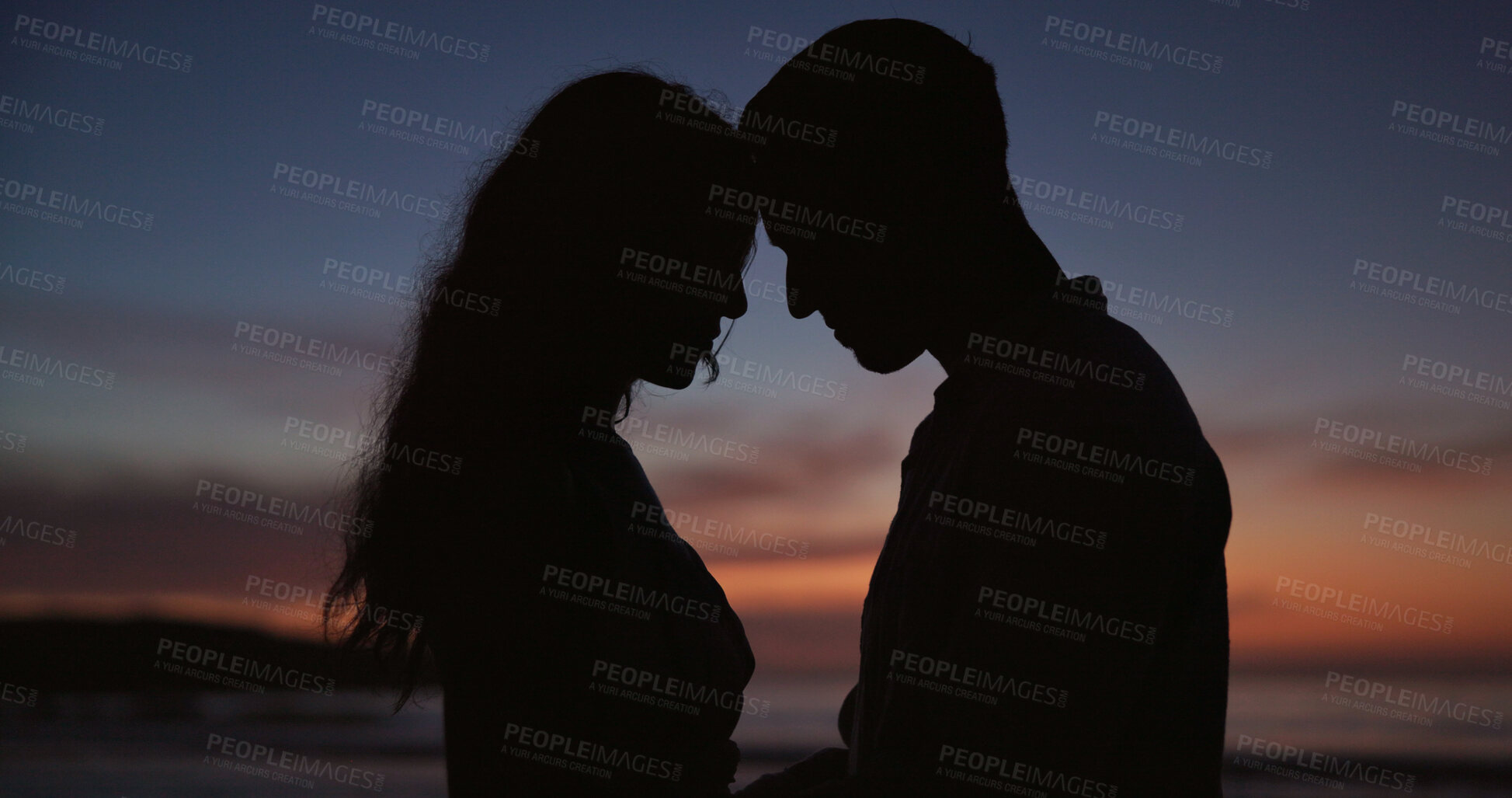 Buy stock photo Silhouette, couple and forehead touch at beach, love and partner affection on romantic holiday. Sunset, people and connection at ocean for celebration, commitment and tropical vacation for adventure
