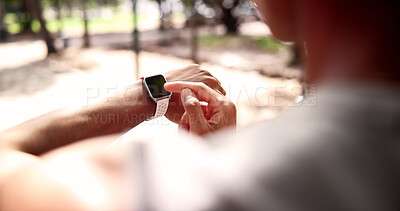 Buy stock photo Fitness, man and hands with watch for heart rate, calories or monitoring performance in nature. Active, male person or checking health with wristwatch for step counter, workout app or exercise goals