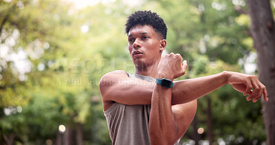Buy stock photo Man, fitness and stretching arms in park for outdoor workout preparation or exercise. Active, male person or getting ready with warm up, start or beginning for training, health or wellness in nature