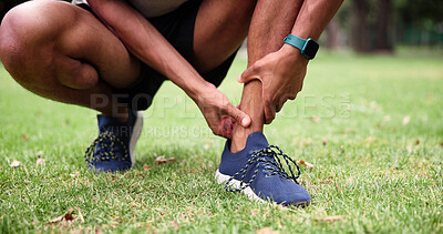 Buy stock photo Park, man and ankle pain with hands, fitness and grass field for exercise and workout with muscle tension. Person, athlete and runner with accident, overworked joint and burnout from training
