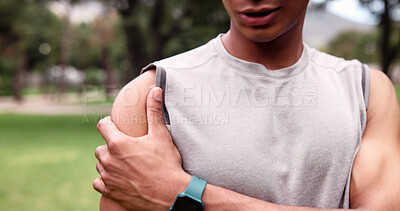 Buy stock photo Shoulder pain, runner and hand of man in nature for training fatigue, accident and muscle strain. Massage, inflammation and sports injury with person outdoor for workout, pressure and tension