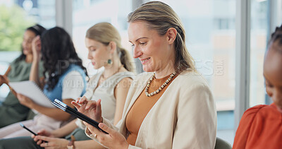 Buy stock photo Woman, tablet and reading in seminar for business, workshop programme and notes app in row. Employee, tech and smile in company forum for development opportunity, upskill training and information