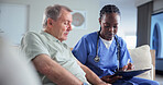 Clipboard, healthcare and nurse talking to old man in home living room for consulting or feedback. Conversation, paperwork and support with caregiver in apartment to explain results to senior patient