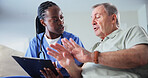 Clipboard, medical and nurse talking to old man in home living room for consulting or feedback. Conversation, healthcare and paperwork with caregiver in apartment to explain results to senior patient