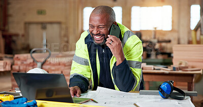 Buy stock photo Architect, laptop and phone call with black man for communication, planning or woodwork. Happy, floor plan and technology for feedback, process and discussion for custom carpentry at warehouse