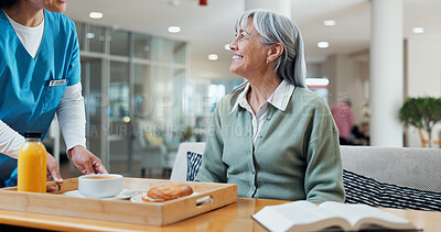 Buy stock photo Assisted living, breakfast and smile of old woman with nurse in dining room for care or support. Food, retirement and thank you with senior person in home for healthy diet, nutrition or wellness