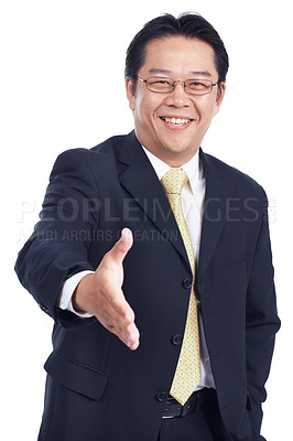Buy stock photo Asian businessman offers you a handshake as he greets you - Isolated on white