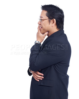 Buy stock photo Side view of a Asian executive looking on in wonder while isolated on white - Copyspace