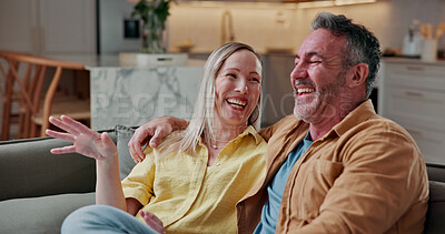 Buy stock photo Relax, laughing and love with couple on sofa in home for bonding, funny joke and connection. Loyalty support and commitment with man and woman in living room in house for comic and humor together