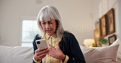 Buy stock photo Stress, old woman and chest pain at house with phone, research and symptoms for heart attack. Discomfort, senior person and mobile app for cardiac emergency, urgent assistance and medical condition