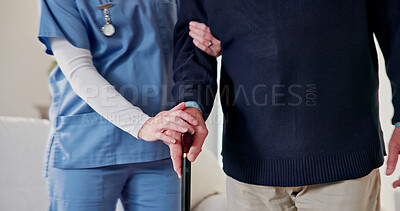 Buy stock photo Hands, caregiver and old person in home with walking stick, support and mobility for rehabilitation. Nurse, helping and senior man with disability, physical therapy and assistance for recovery