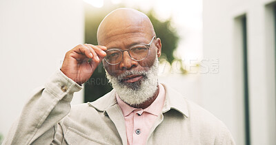 Buy stock photo Senior, backyard and portrait of black man in new house for property investment, pride and relax. Moving in, retirement and glasses with elderly person outdoor of home for growth and security