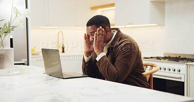 Buy stock photo Headache, laptop and black man with stress in kitchen for project finance, remote work or debt. Male person, freelancer or migraine on computer for financial crisis, bankruptcy or mistake in home