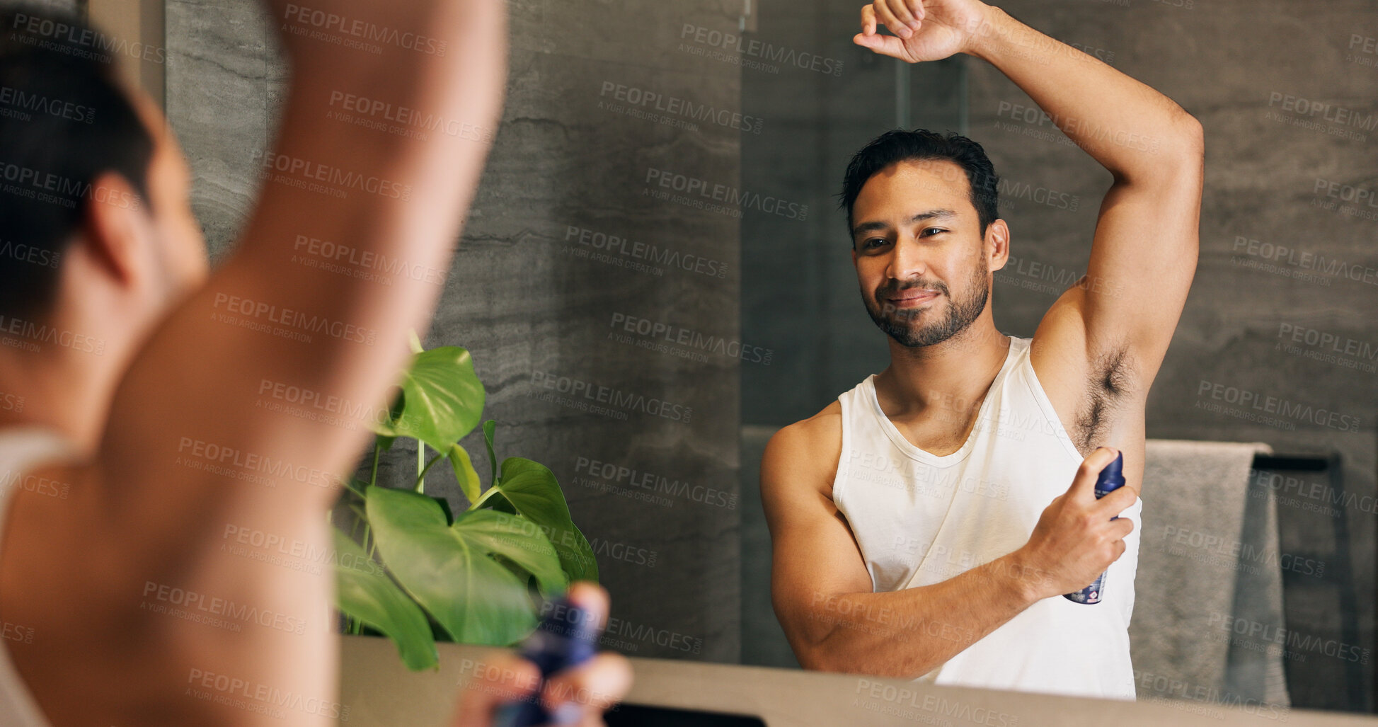 Buy stock photo Deodorant, bathroom and man with mirror in home for grooming, hygiene and scent for cleaning. Morning routine, wellness and person with underarm, spray and antiperspirant product for sweat and health