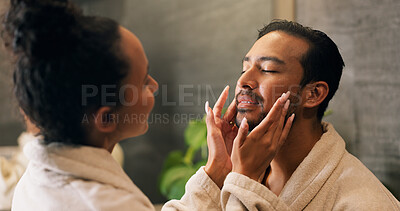 Buy stock photo Couple, skincare and face cream in bathroom with morning routine, dermatology or hydration benefits. Married, people and apply moisturizer in home for clear skin, beauty cosmetics or bonding together