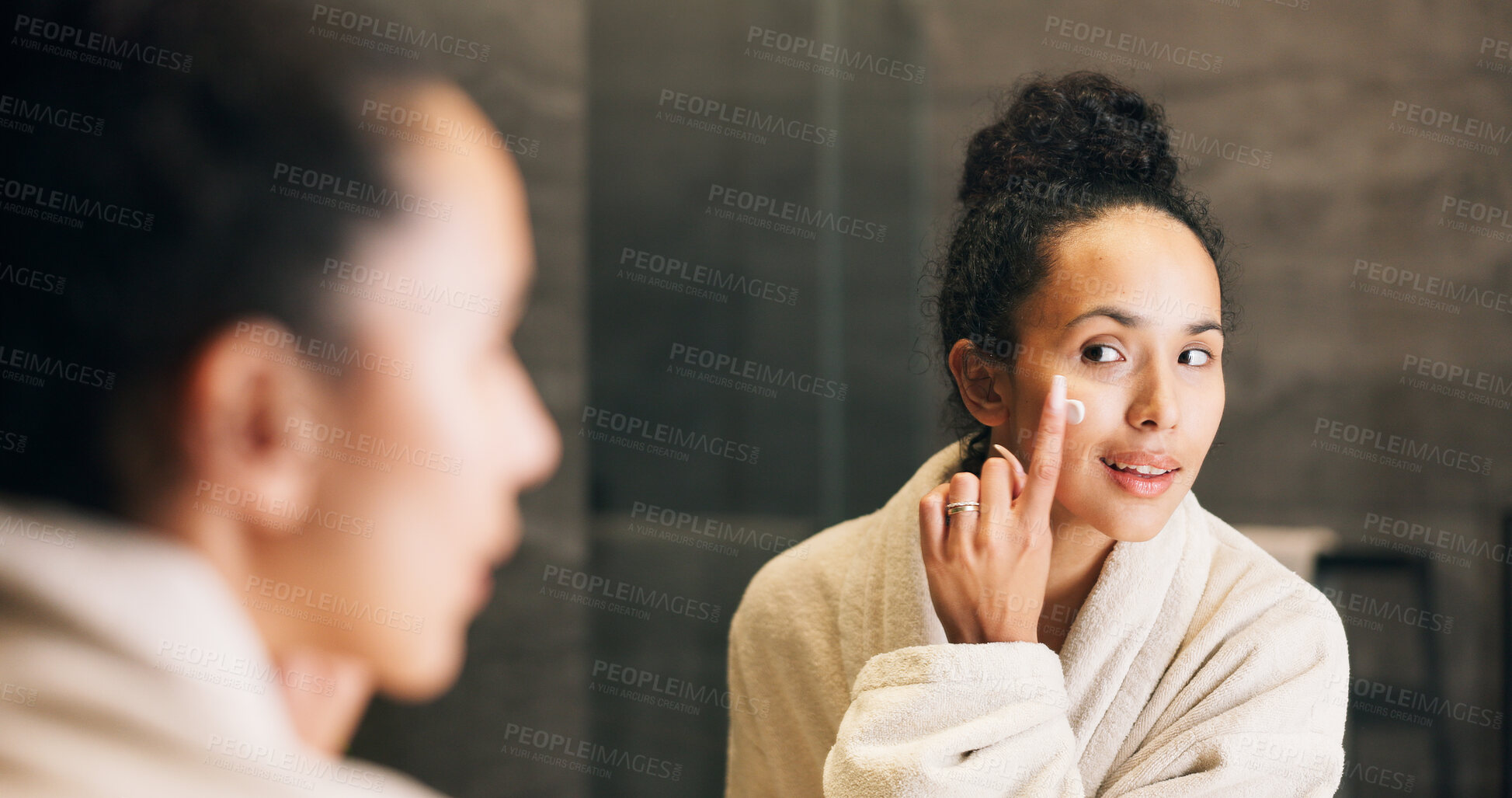 Buy stock photo Mirror, woman and face cream in bathroom for skincare, hydration benefits or morning routine for beauty. Person, apply moisturizer and lotion in home for reflection, getting ready and dermatology.
