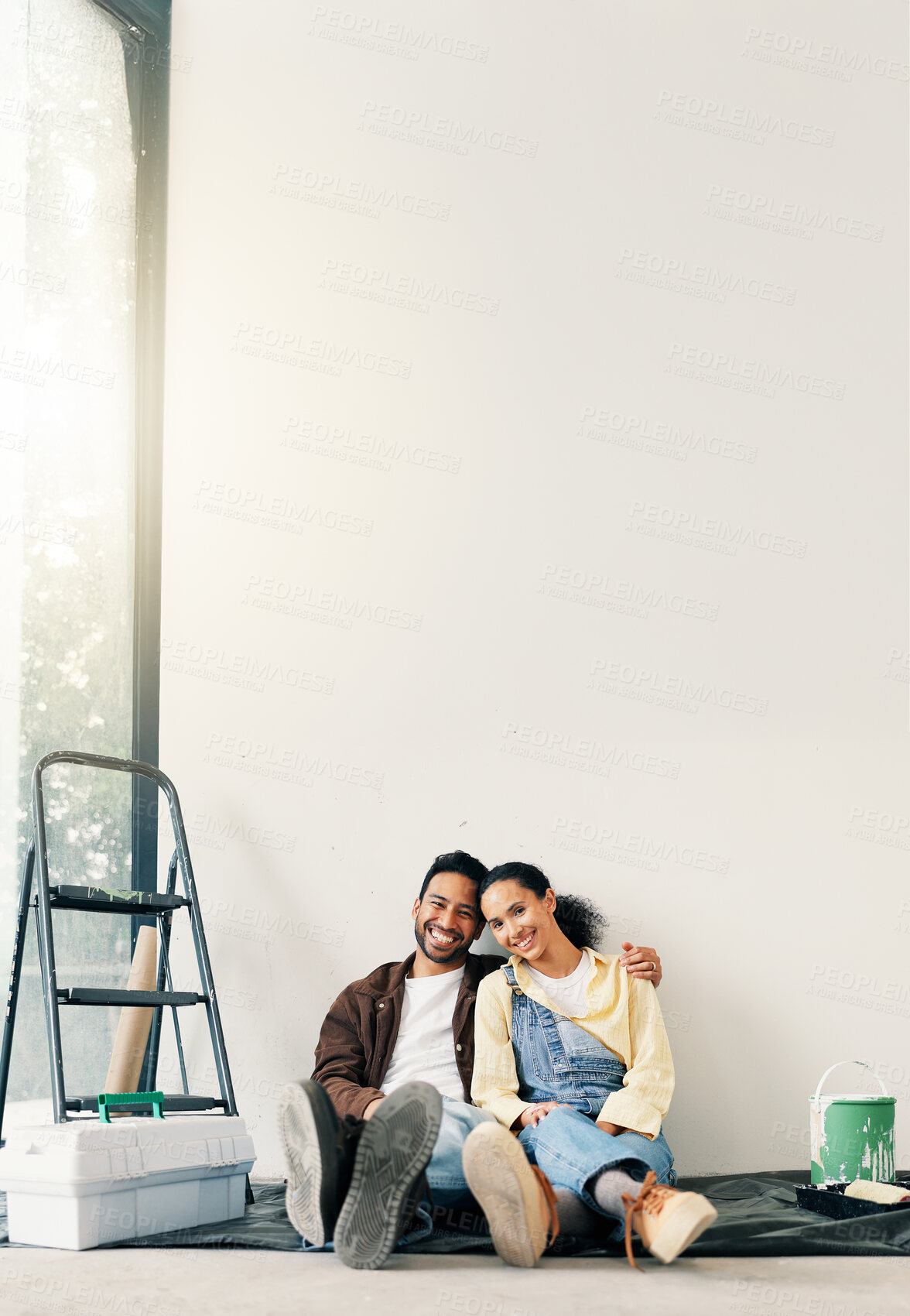 Buy stock photo Happy, wall and portrait of couple in new house for renovation, repairs or property development. Space, bonding and man with woman for painting, maintenance or planning on project in apartment.