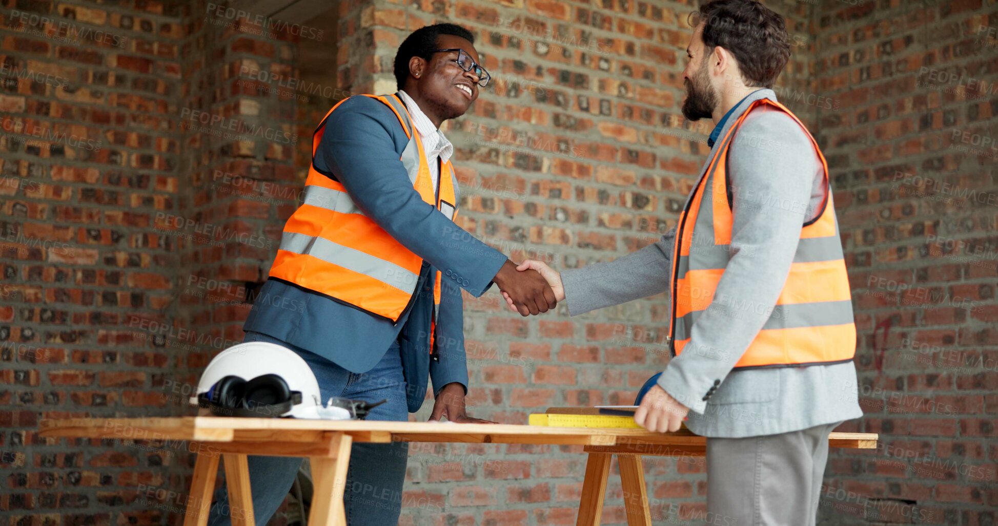 Buy stock photo Architect, men and handshake on construction site, agreement and teamwork for real estate investment. Happy people, shaking hands and collaboration for property development and success in building