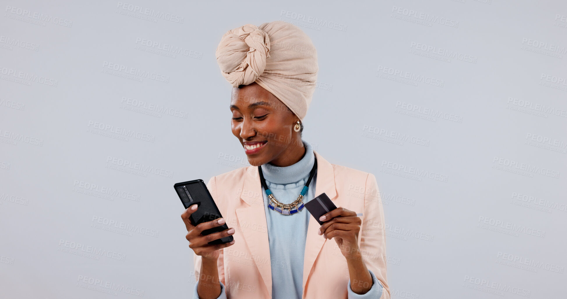 Buy stock photo Happy, phone or black woman with credit card in studio for online shopping on a white background. Female person, shopper or smile with smartphone or debit for mobile banking app, payment or ecommerce