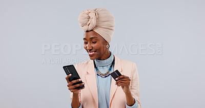 Buy stock photo Happy, phone or black woman with credit card in studio for online shopping on a white background. Female person, shopper or smile with smartphone or debit for mobile banking app, payment or ecommerce