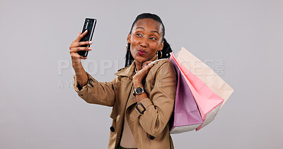 Buy stock photo Happy, selfie and black woman with shopping bags in studio for photography on a white background. Female person, user or shopper with picture, gifts or presents for memory, store discount or deal