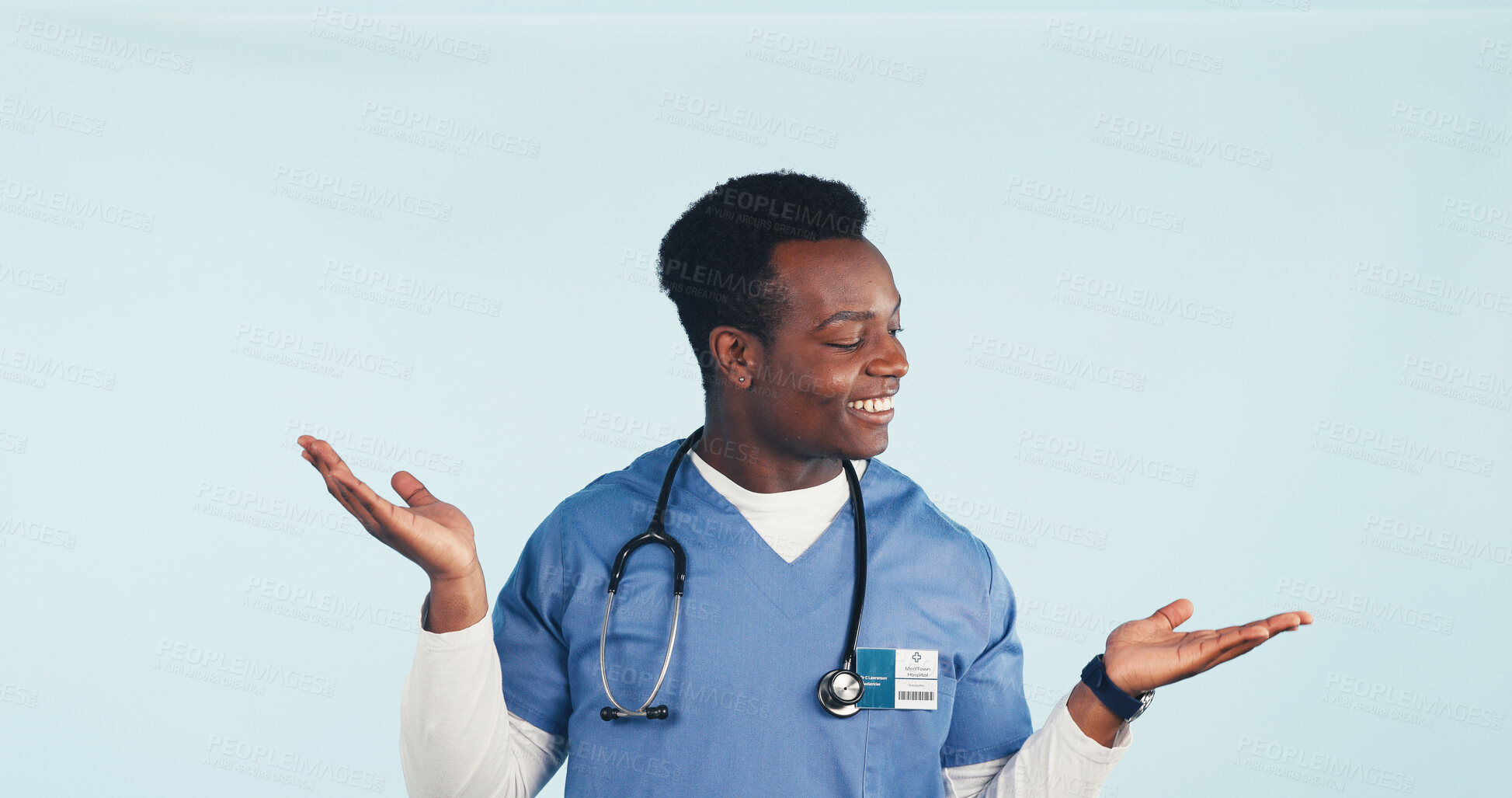 Buy stock photo Doctor, option and black man with palm in studio for medical treatment on a blue background. Happy, male person or healthcare worker with smile, choice or decision for pick or selection on space
