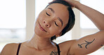 Fitness, woman and stretching neck in home for training preparation, wellness or pilates practice. Warm up, exercise and happy person getting ready for workout, health and self care for vitality