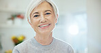 Happy, relax and portrait of senior woman in home with positive attitude, calm or chilling on weekend. Smile, pension and elderly person in retirement with morning break in living room at apartment.