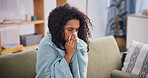Blanket, woman and sick with sneeze in home for seasonal allergies, fatigue and respiratory virus. Recovery, fever and unwell person with runny nose on sofa from influenza, viral infection and sinus