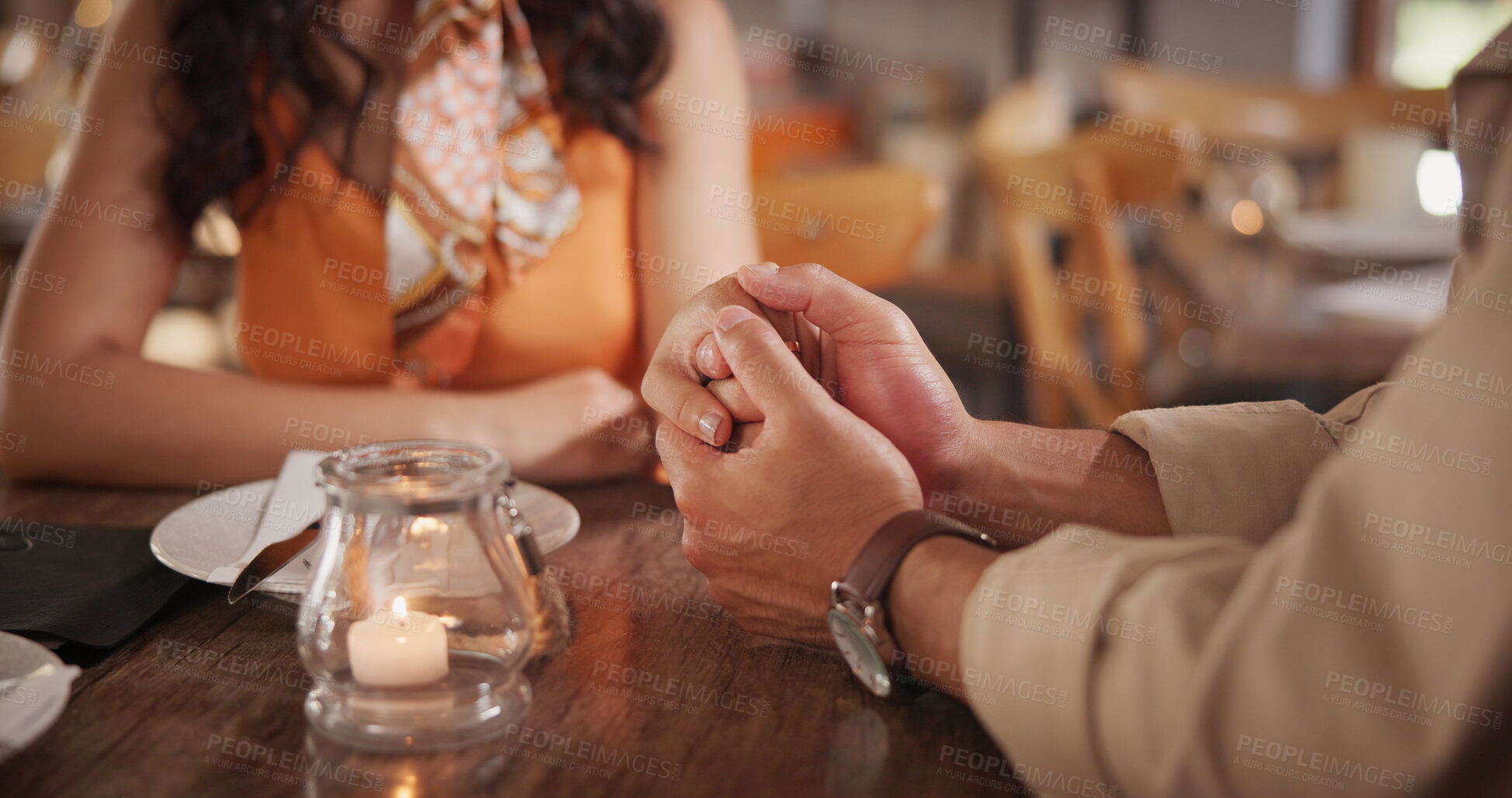 Buy stock photo Couple, holding hands and commitment on date in restaurant, love or connection with partner on break. Relationship, trust and people in diner for anniversary, support and bonding together on weekend