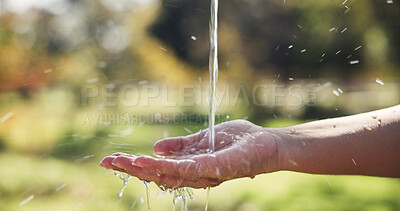 Buy stock photo Nature, water and person washing hands outdoor for hygiene, sanitation and grooming with self care. Wellness, health and cleaning skin in park for removal of dirt, germs or bacteria in countryside.