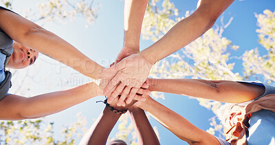 Buy stock photo Nature, circle and people with stack of hands for support, solidarity and trust in non profit organization. Bonding, low angle and group of volunteers with collaboration for connection in ngo at park