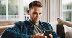 Phone, happy and man on sofa in home with texting, chatting or social media on mobile app. Smile, relax and person on cellphone for reading online blog for tips or advice in living room at apartment.
