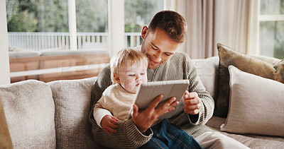 Buy stock photo Father, boy and smile with tablet on couch for elearning video, bonding and relax in living room. Man, dad and child with tech, movies and streaming subscription with funny cartoon in family house