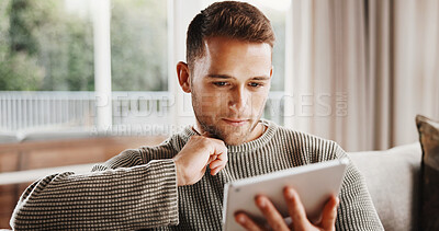 Buy stock photo Tablet, reading and man on sofa in home with texting, communication or social media on app in living room. Smile, relax and person with digital technology for online chatting for contact in apartment