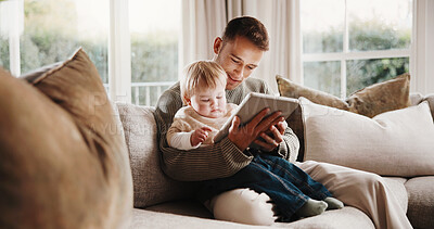 Buy stock photo Father, boy and relax with tablet on couch for elearning video, bonding and smile in living room. Man, dad and child with tech, movies and streaming subscription with funny cartoon in family house