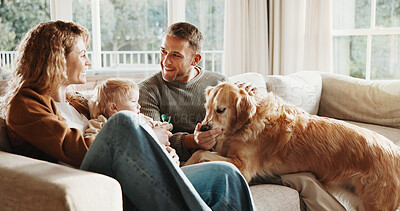 Buy stock photo Parents, baby and dog with love on couch for care, play and smile for bonding or connection in home. Father, mother and child in living room for pet animal, stroke and relax on sofa at family house