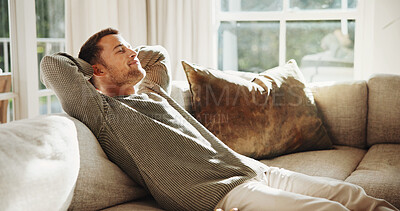 Buy stock photo Relax, home and happy man on sofa with comfort for holiday rest, summer break or free time. Calm, male person or homeowner with eyes closed or smile on living room couch for weekend vacation in house