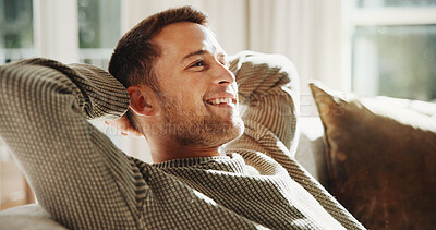 Buy stock photo Relax, home and break with happy man on sofa for holiday rest, lazy summer or free time. Calm, male person or homeowner thinking with smile on living room couch for weekend vacation or plan in house