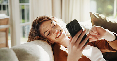 Buy stock photo Phone, happy and woman on sofa in home with texting, chatting or social media on mobile app. Smile, relax and person on cellphone for reading online blog for tips or advice in living room at house.