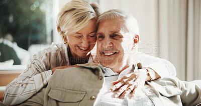 Buy stock photo Hug, happy and couple on sofa in home for bonding, love and connection in marriage on weekend. Smile, care and mature woman embracing man in living room for commitment, relax or safety in apartment.