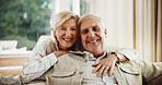 Hug, love and portrait of couple on sofa in home for bonding, happiness and connection in marriage. Smile, care and mature woman embracing man in living room for commitment, relax or safety in house.